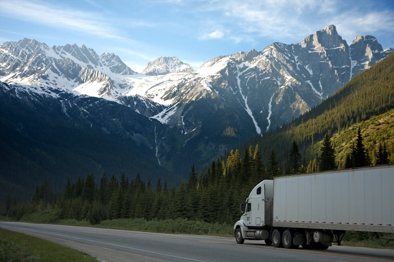 Freight truck travelling on a mountain road